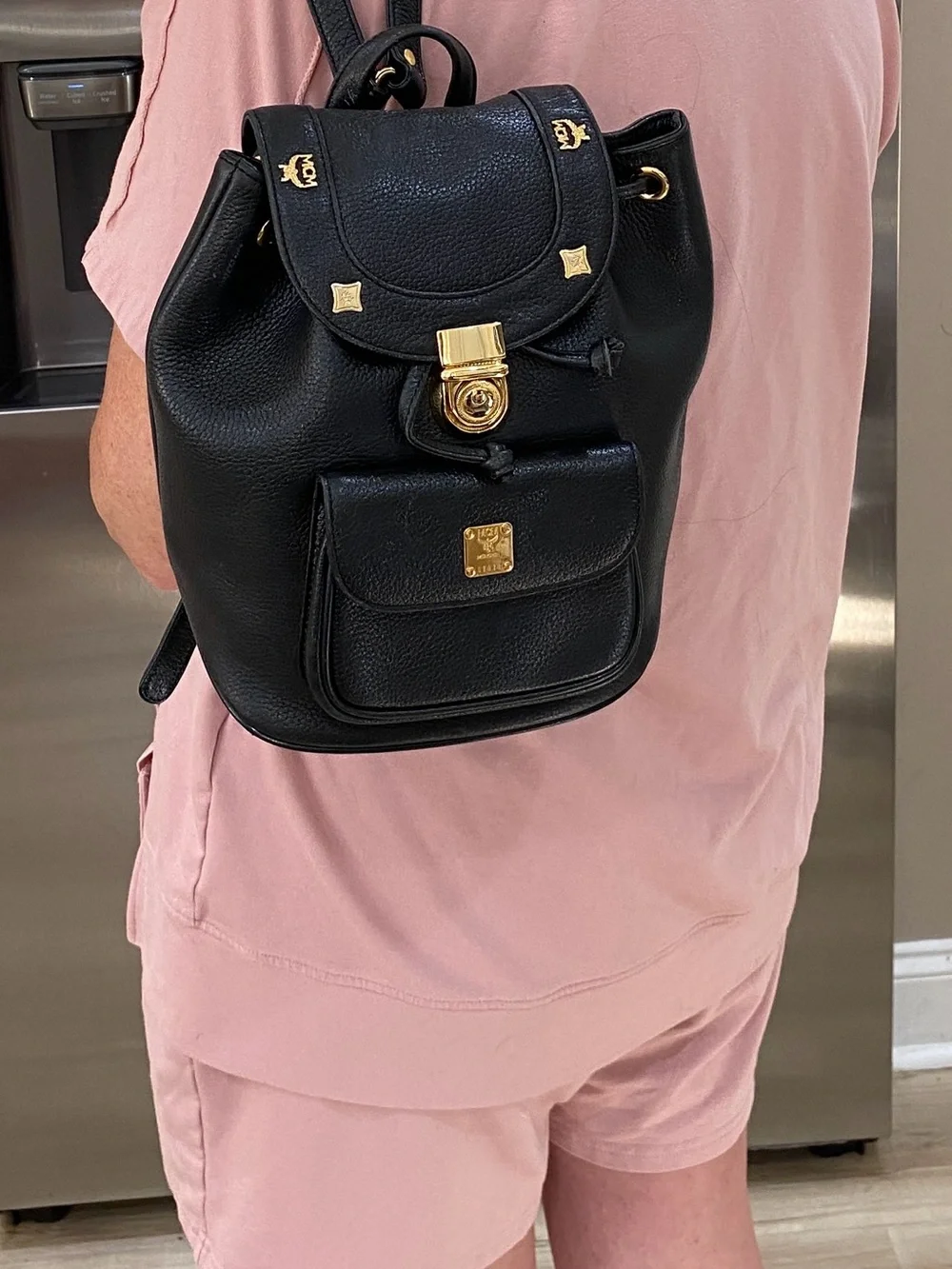 MCM Black Leather Mini Backpack with Gold Hardware Accents